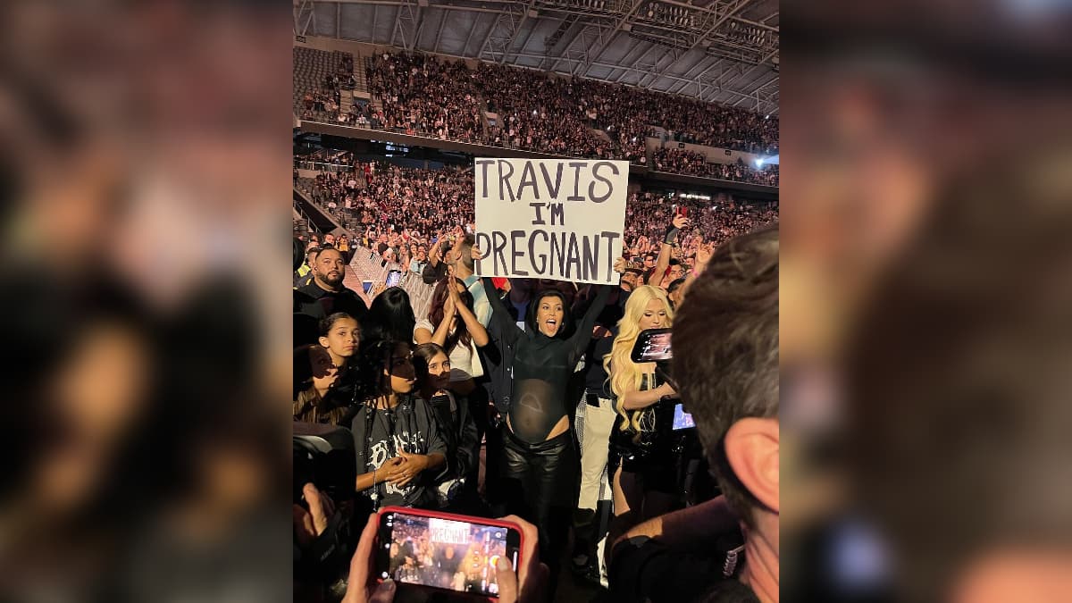 Travis I'm Pregnant Sign